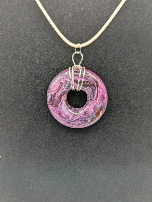 Wire Wrapped Donut Resin Pendant Necklace - Petri Effect with shades of purple, pink, & red swirls. Resin Necklace on a waxed cotton cord.