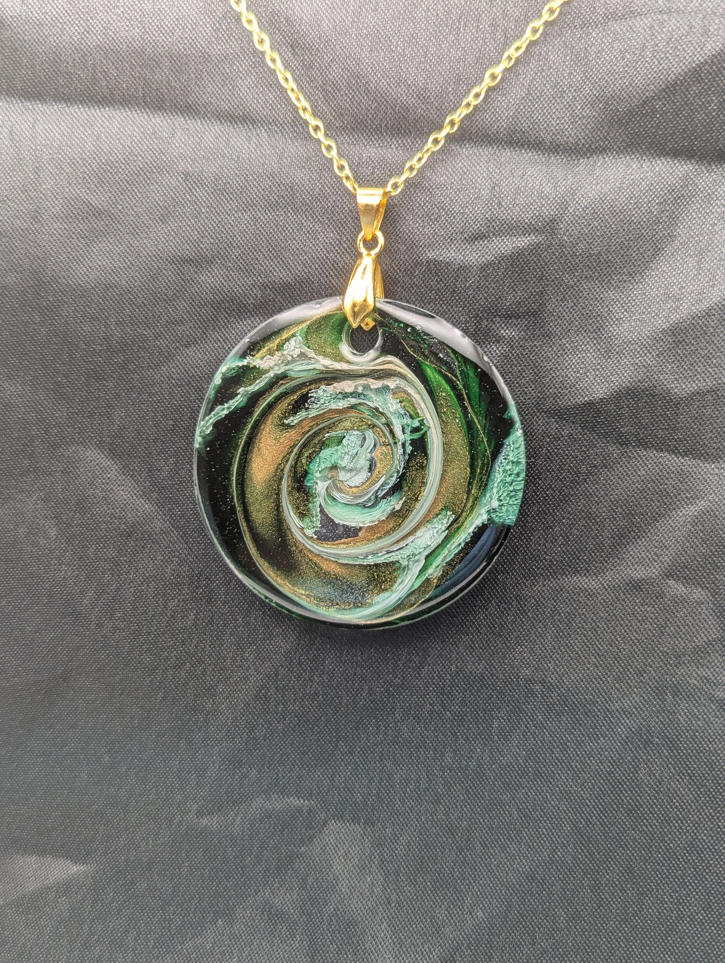 Green & Gold Swirl Circle Pendant on a gold pinch bail & gold plated stainless steel chain. Resin Circle Jewelry Pendant with Petri Effect.