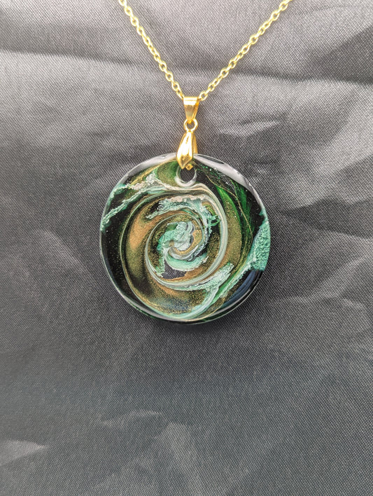 Green & Gold Swirl Circle Pendant on a gold pinch bail & gold plated stainless steel chain. Resin Circle Jewelry Pendant with Petri Effect.