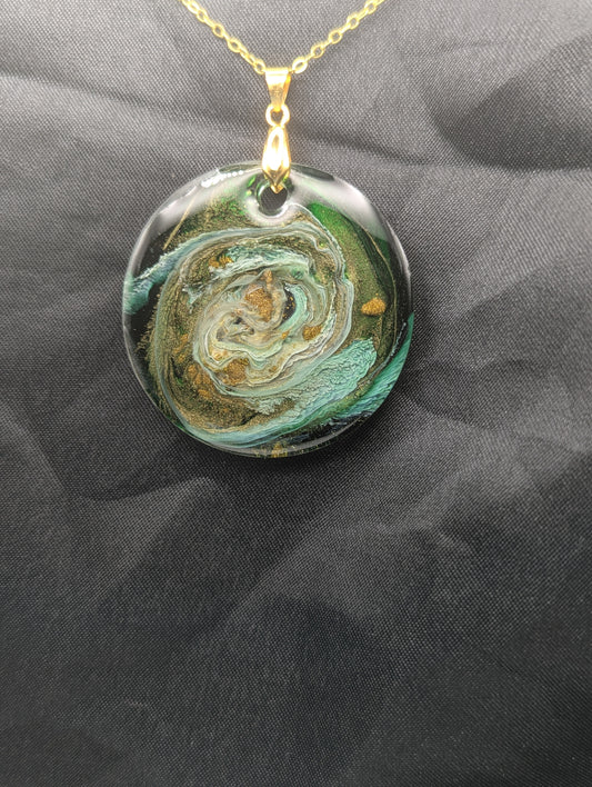 Green & Gold Swirl Circle Pendant on a gold pinch bail & gold plated metal chain. Resin Circle Jewelry Pendant with Petri Effect.