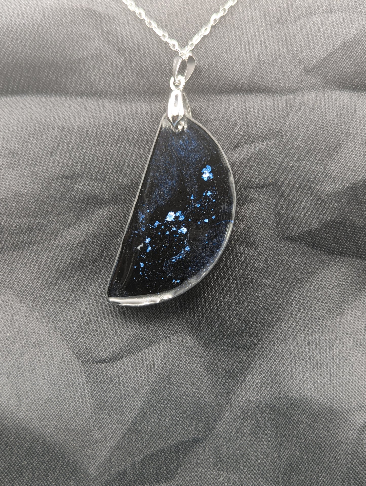 Back view of Black & Ghost Violet Swirl Half-Circle Pendant on a silver pinch bail & stainless steel chain
