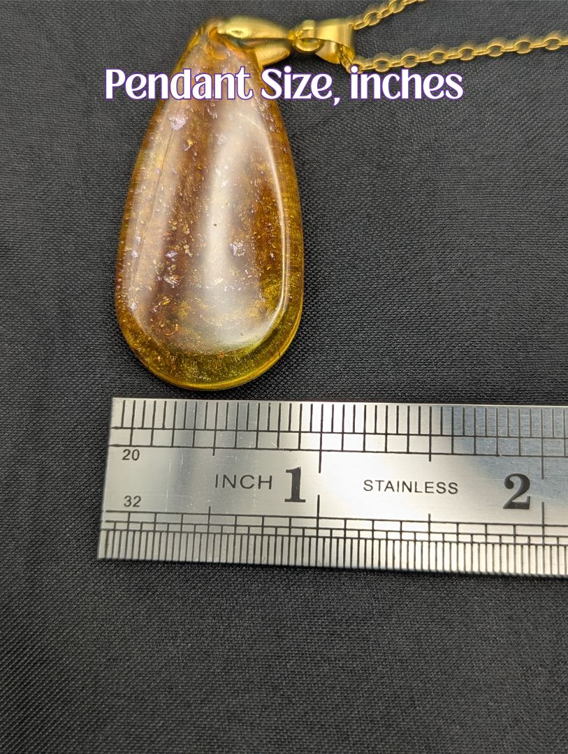 Size example pic of pendant size in inches, showing pendant is about 0.75 inches wide.