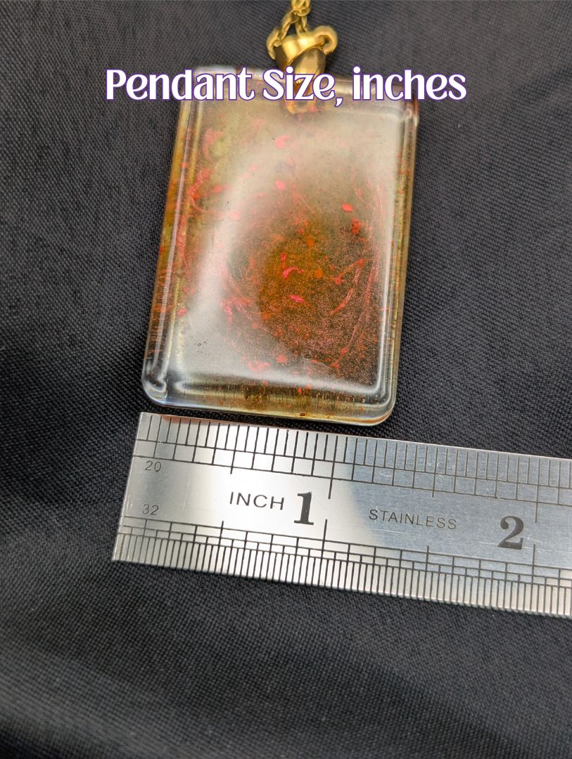 Size example pic of pendant size in inches, showing pendant is about 1.25 inches wide.