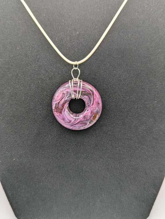 Wire Wrapped Donut Resin Pendant Necklace - Petri Effect with shades of purple, pink, & red swirls. Resin Necklace on a waxed cotton cord.
