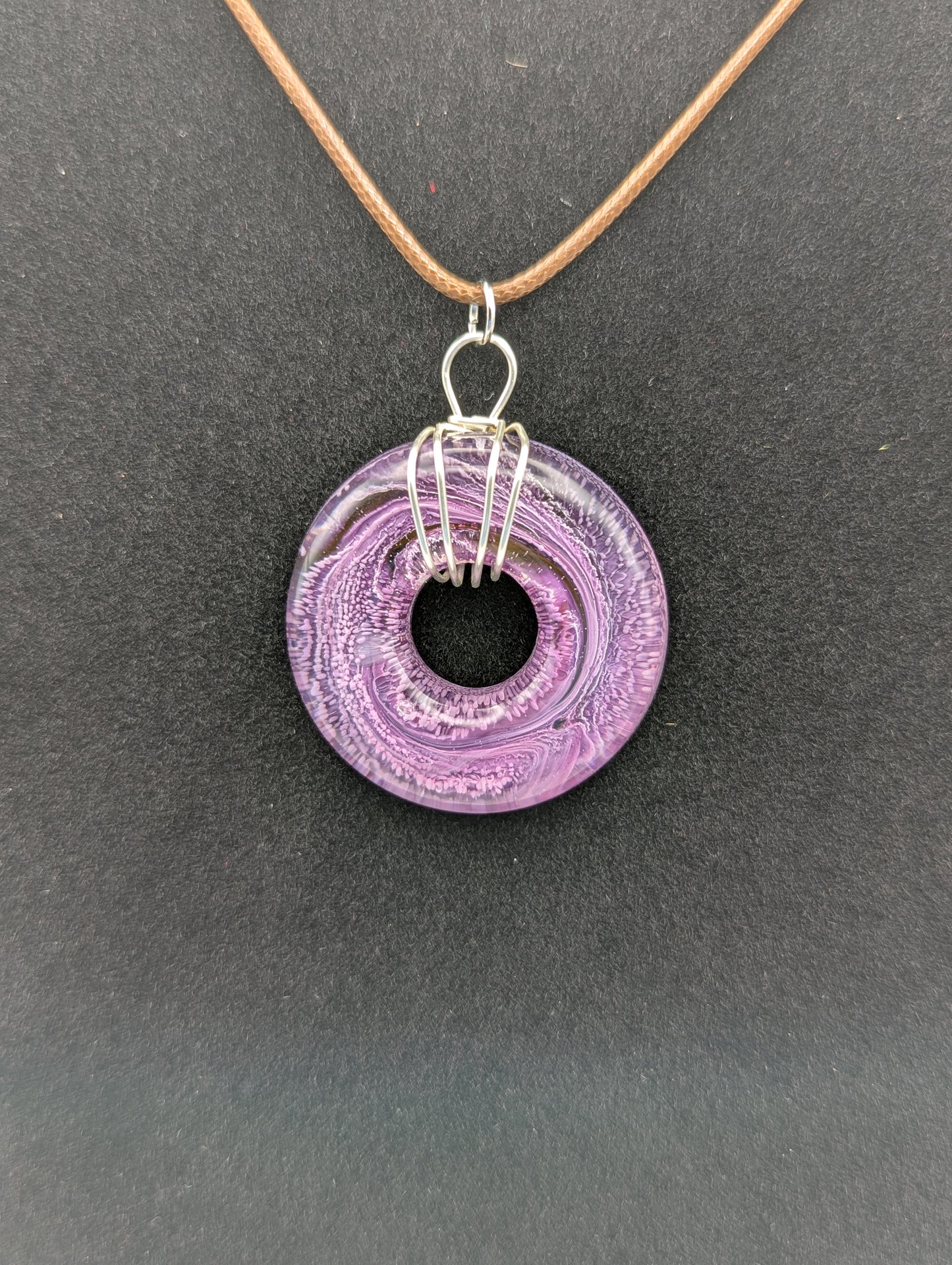 Wire Wrapped Donut Resin Pendant Necklace - Petri Effect with shades of purple & pink. Resin Necklace on a waxed cotton cord.