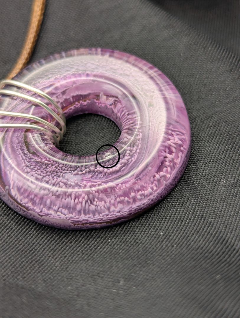 Wire Wrapped Donut Resin Pendant Necklace - Petri Effect with shades of purple & pink. Resin Necklace on a waxed cotton cord.