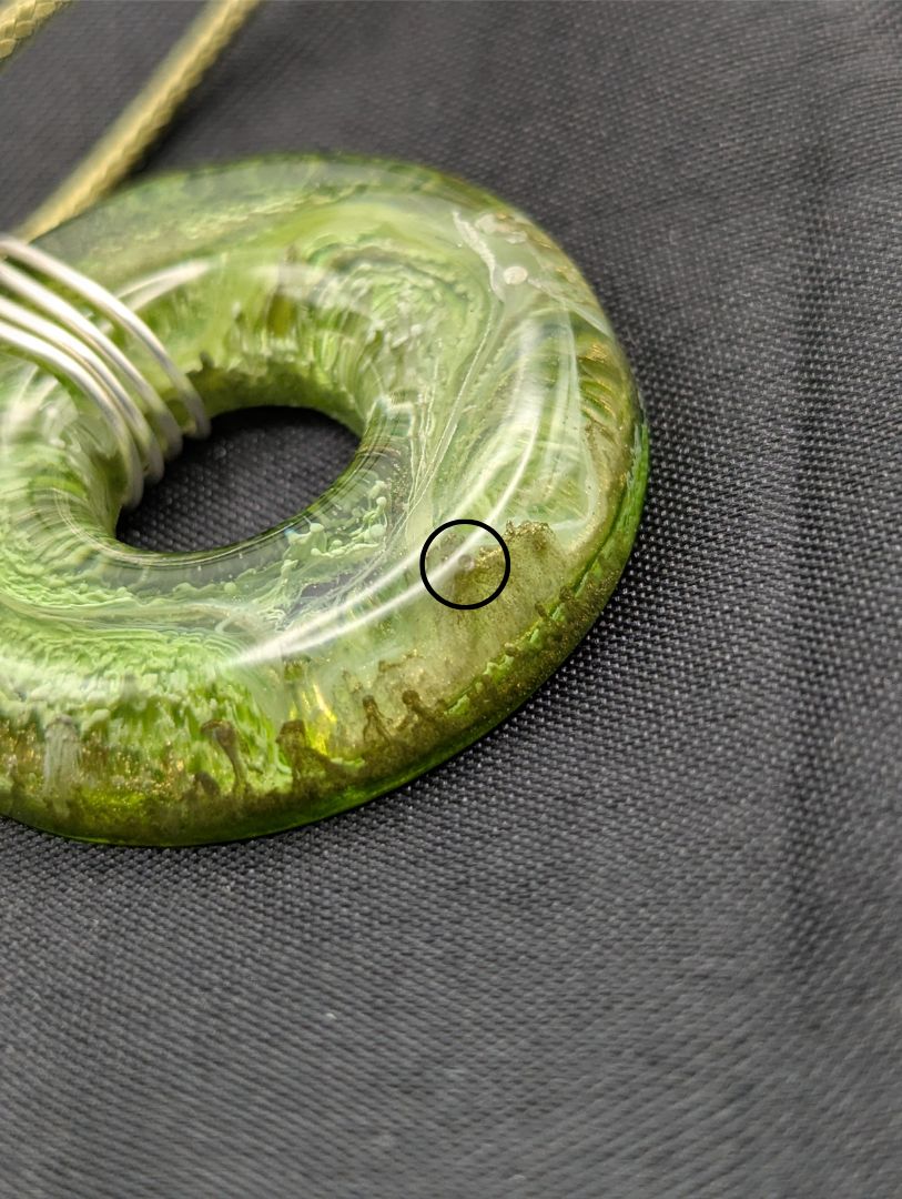 Wire Wrapped Donut Resin Pendant Necklace - Petri Effect with shades of green. Resin Necklace on a waxed cotton cord.
