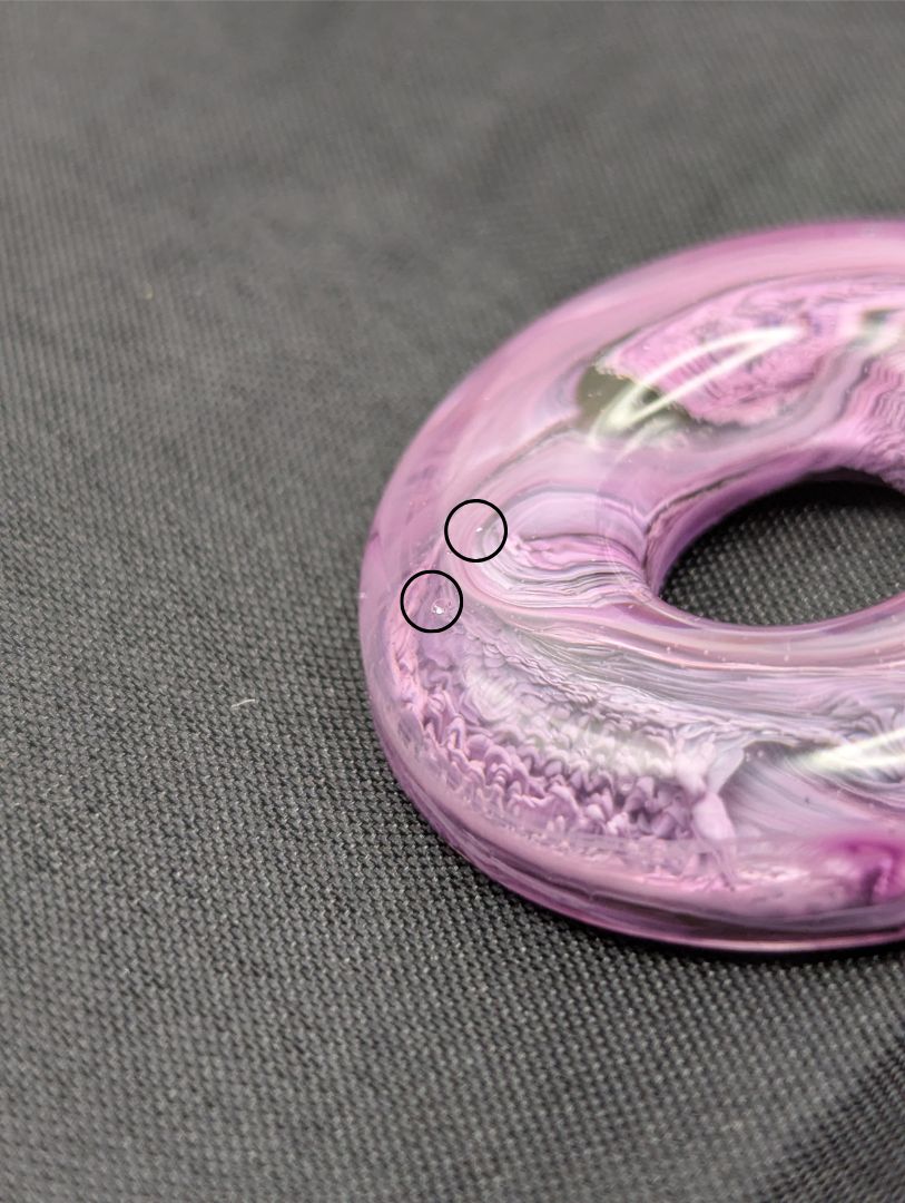 Wire Wrapped Donut Resin Pendant Necklace - Petri Effect with shades of purple. Resin Necklace on a waxed cotton cord.