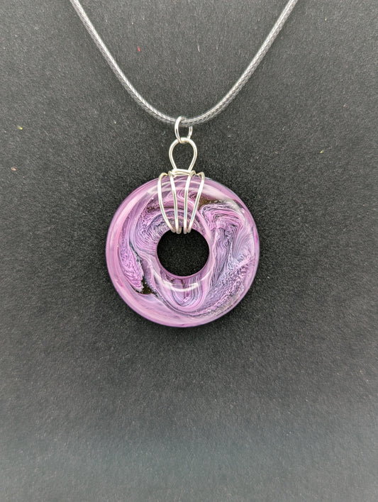 Wire Wrapped Donut Resin Pendant Necklace - Petri Effect with shades of purple. Resin Necklace on a waxed cotton cord.