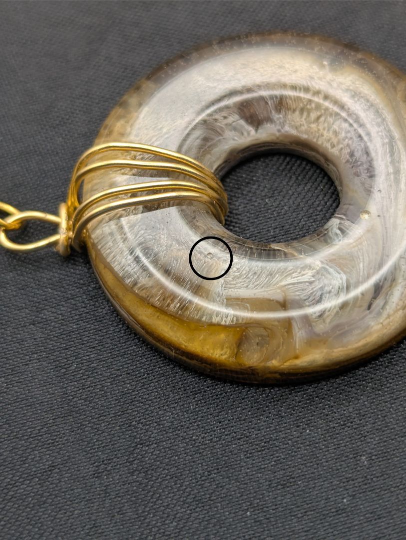 Wire Wrapped Donut Resin Pendant Necklace - Petri Effect with shades of yellow & brown swirls. Resin Necklace on a waxed cotton cord.