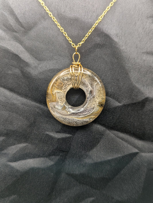 Wire Wrapped Donut Resin Pendant Necklace - Petri Effect with shades of yellow & brown swirls. Resin Necklace on a waxed cotton cord.