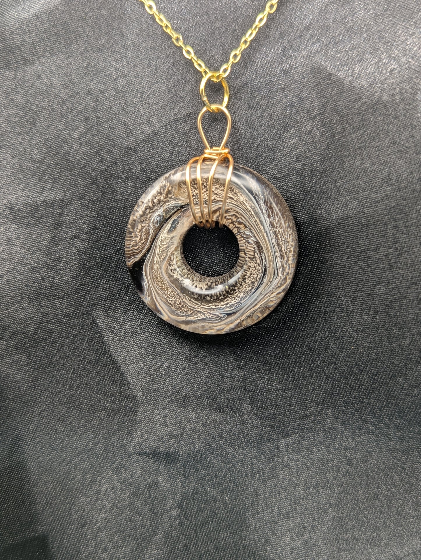 Wire Wrapped Donut Resin Pendant Necklace - Petri Effect with shades of brown swirls. Resin Necklace on a gold plated metal chain