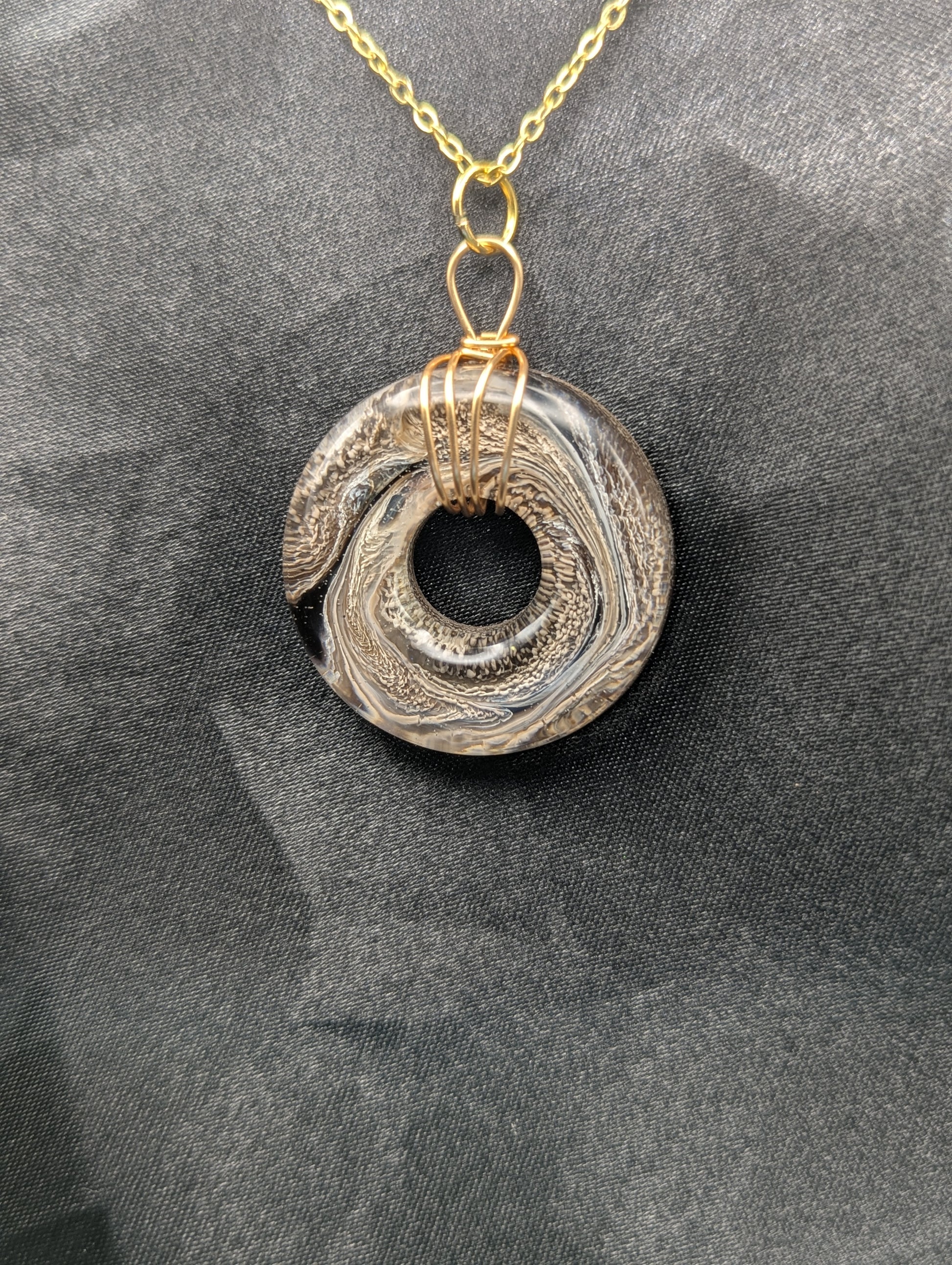 Wire Wrapped Donut Resin Pendant Necklace - Petri Effect with shades of brown swirls. Resin Necklace on a gold plated metal chain