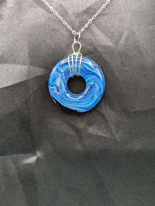 Wire Wrapped Donut Resin Pendant Necklace - Petri Effect with shades of blue swirls. Resin Necklace on a stainless steel chain