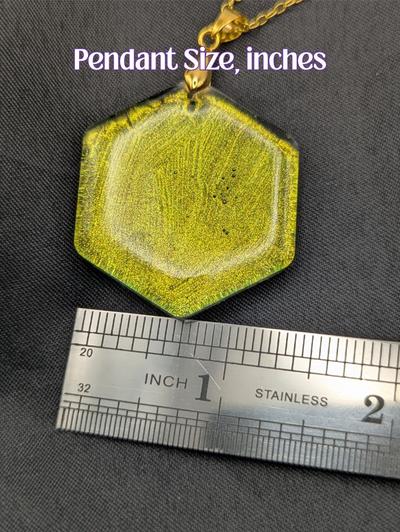 Size example pic of pendant size in inches, showing pendant is about 1.5 inches across.