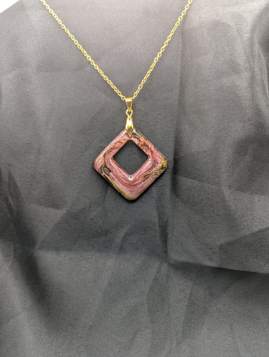 Pink & brown swirl square pendant necklace on a gold plated metal chain