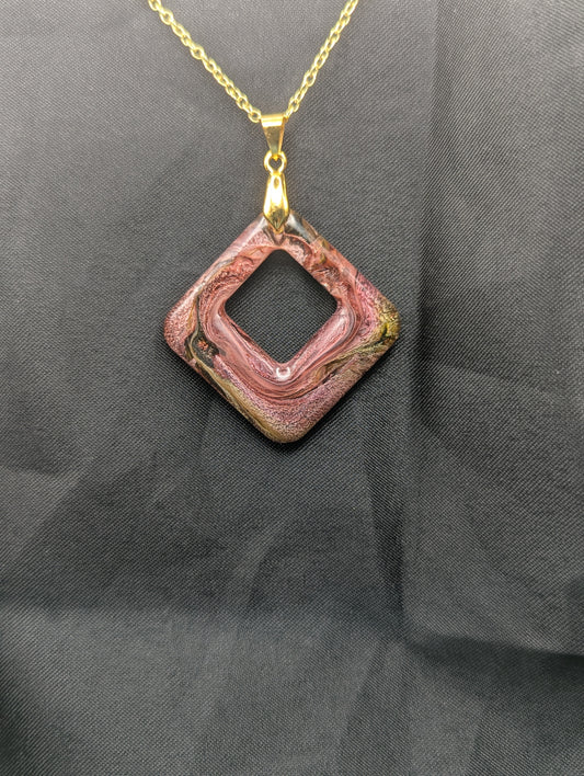 Pink & brown swirl square pendant necklace on a gold plated metal chain