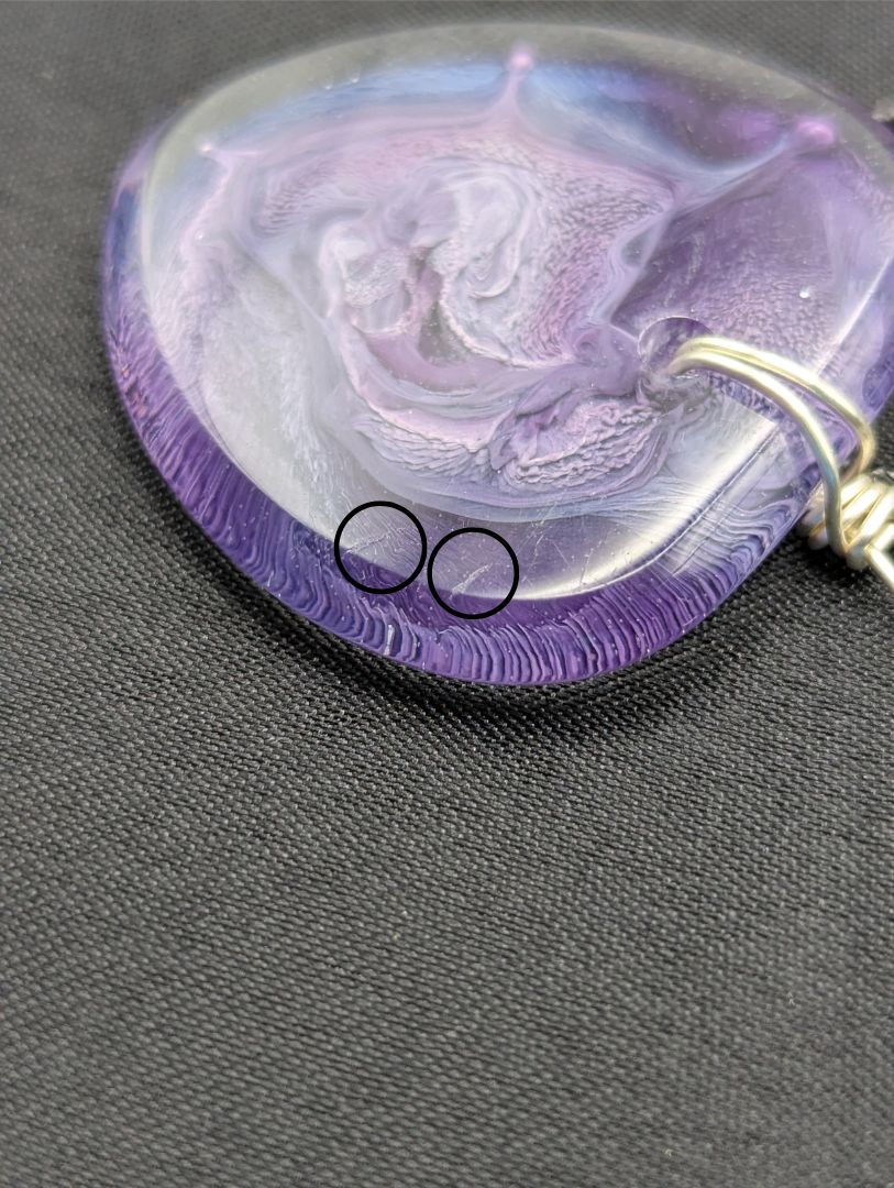 Wire Wrapped Arrow Resin Pendant Necklace - Petri Effect with shades of purple & blue swirls. Resin Necklace on a waxed cotton cord.