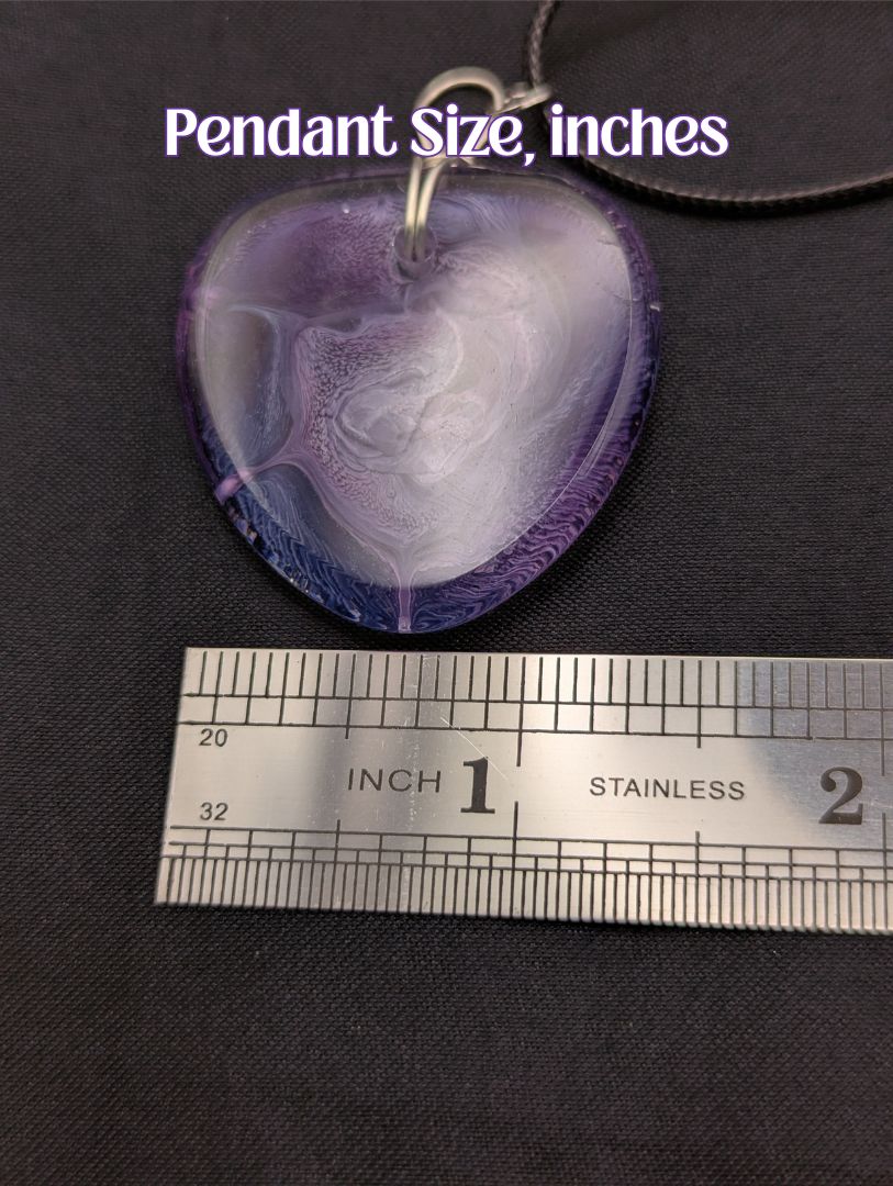 Size example pic of pendant size in inches, showing pendant is about 1.25 inches across.