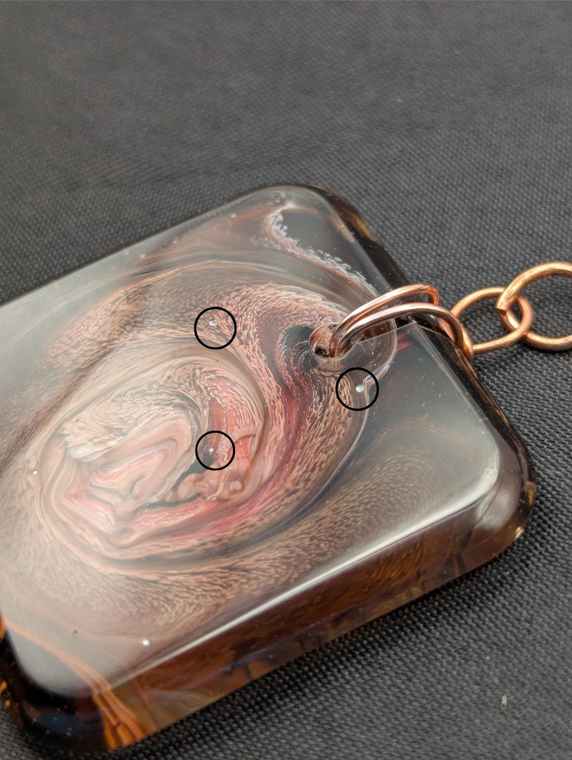 Red & Brown Swirl Square Pendant wrapped in a solid copper wire on a rose gold colored stainless steel plated metal chain. Resin Square Jewelry Pendant with Petri Effect.