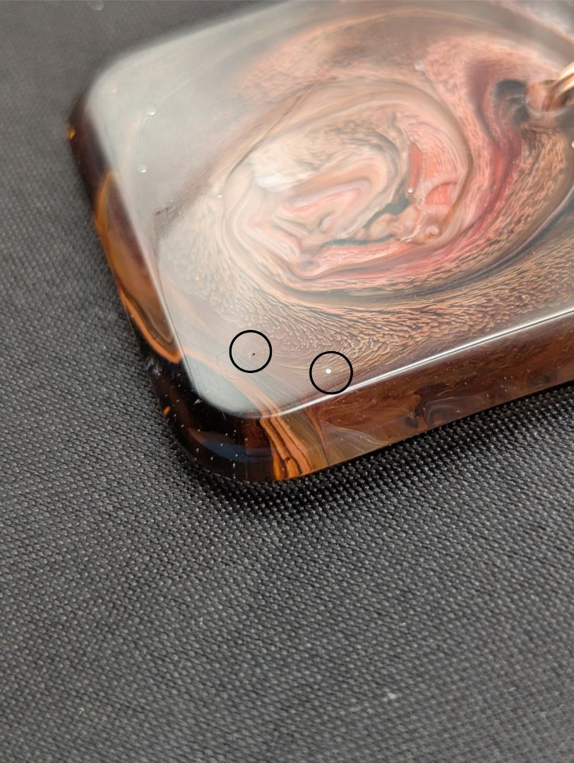 Red & Brown Swirl Square Pendant wrapped in a solid copper wire on a rose gold colored stainless steel plated metal chain. Resin Square Jewelry Pendant with Petri Effect.