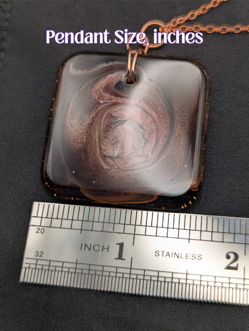 Size example pic of pendant size in inches, showing pendant is about 1.5 inches across.