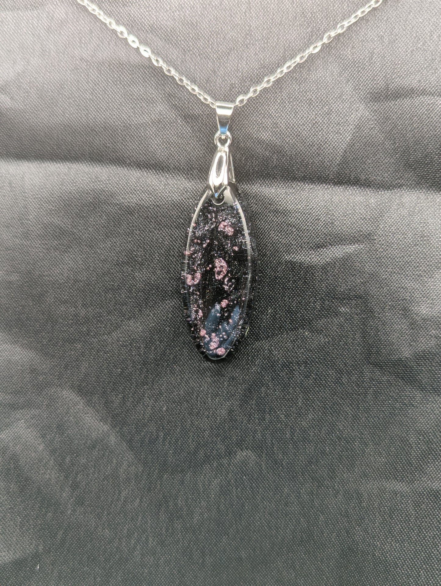 Black & Purple Swirl Ellipse Pendant on a silver pinch bail & stainless steel chain.