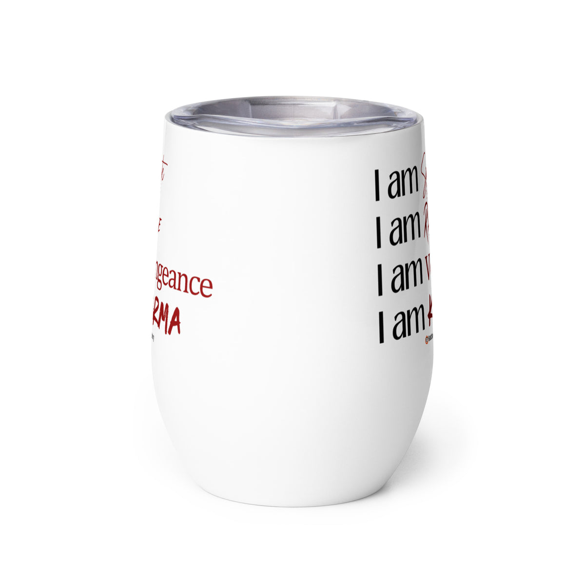 An insulated stemless wine glass with a lid for drinking wine in a tumbler. Cup is white in color with the words "I am spite, I am rage, I am vengeance, I am karma" on it. Each "I am" is in black font & the other words are in red font & different scripts.